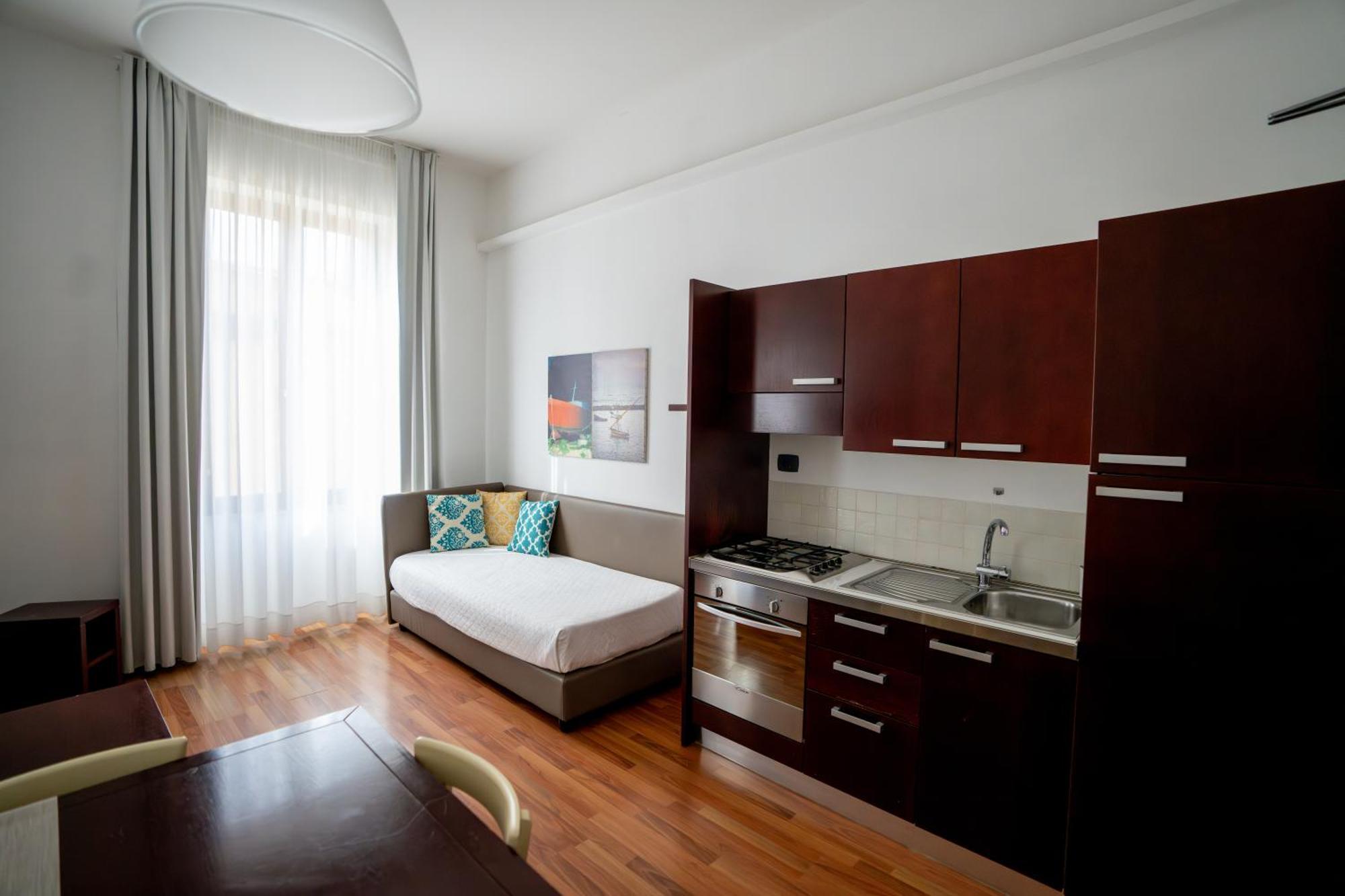 บาเดีย นูโอวา เรสซิเดนซ์ Hotel ตราปานี ห้อง รูปภาพ